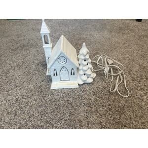 Christmas ceramic church with light, with Christmas tree and church steeple
